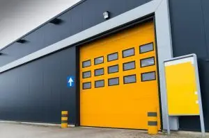 Sectional glass garage door